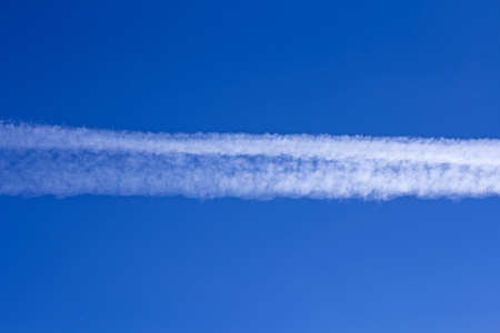 Trace of the plane in the sky.