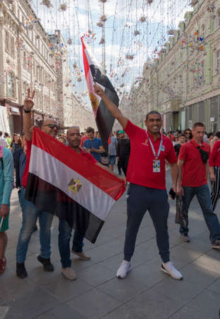 MOSCOW - JUNE 17, 2018: Soccer World Cup Fanatics of Egypt with flags with their typical costumes in the streets June 17, 2018 in Moscow, Russia.のeditorial素材