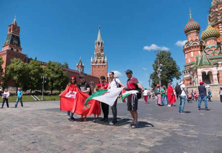 MOSCOW - JUNE 20, 2018: Soccer World Cup Fanatics of Tunisia, Morocco, Algeria, Jordan with flags...