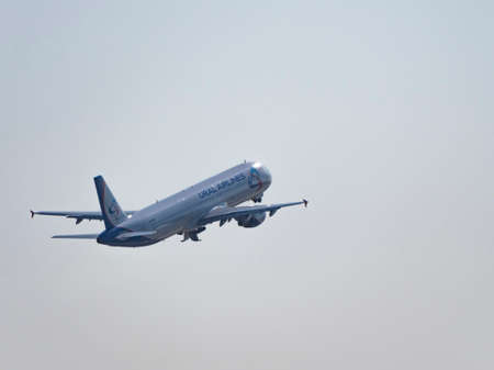 MOSCOW , RUSSIA, June 10, 2019: The Commercial passenger airplane flying overhead on sunny day on June 10, 2019 in Moscow, Russia.のeditorial素材