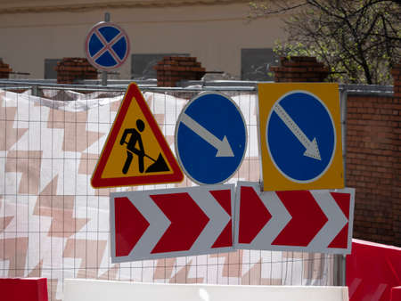 Works ahead warning sign on a road.
