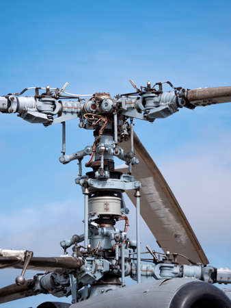 The mechanism of co-axial screws military helicopter on the background of blue sky, a close-upの写真素材