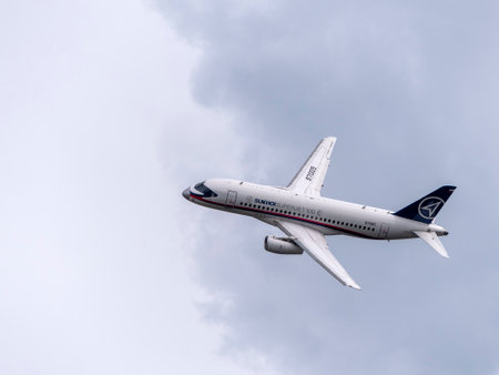 Moscow Russia Zhukovsky Airfield 25 July 2021: Commercial passenger airplane Sukhoi Superjet 100 flying demonstration flight of the international aerospace salon MAKS-2021.のeditorial素材