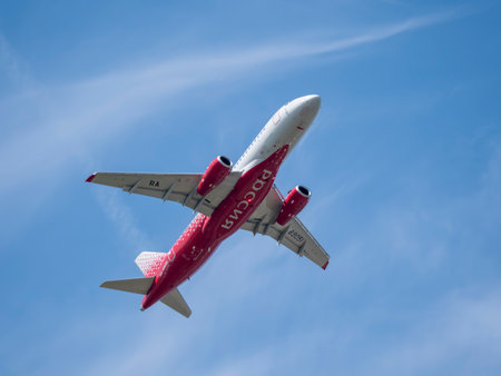 MOSCOW , RUSSIA, June 10, 2019: The Commercial passenger airplane flying overhead on sunny day on...