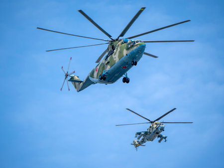 MOSCOW, RUSSIA - MAY 7, 2021: Avia parade in Moscow. Mi-26 and Mi-24 helicopters fly in the sky on parade of Victory in World War II in Moscow, Russiaのeditorial素材