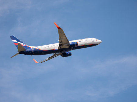 MOSCOW , RUSSIA, June 10, 2019: The Commercial passenger airplane flying overhead on sunny day on June 10, 2019 in Moscow, Russia.のeditorial素材