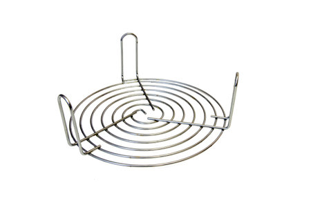 Microwave oven round baking grill rack isolated on white.の写真素材