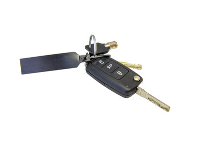 Black car Key and Keychain on white background.の写真素材