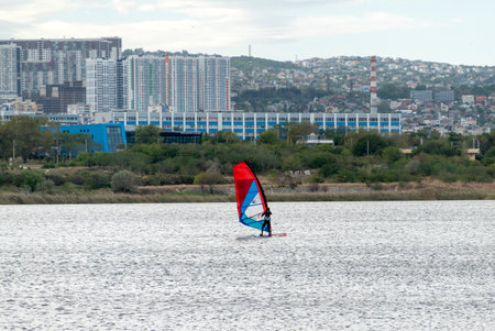 A kite surfer rides and jumps the waves the black sea.の写真素材