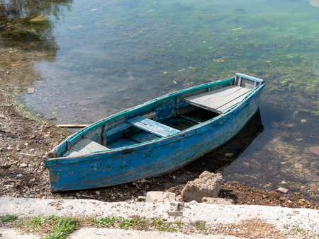 Small wooden boats of multiple colors moored on the shore of Lake Abrau.の写真素材