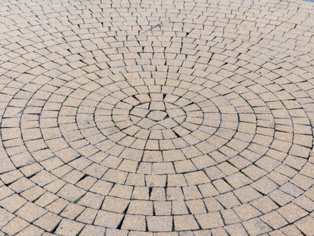 Stone paving stones, cobblestone road and the embankment of the city.の写真素材