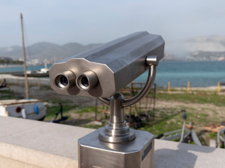 Paid binocular telescope on the tip of the at Black Sea coast in Russia Novorossiysk City.