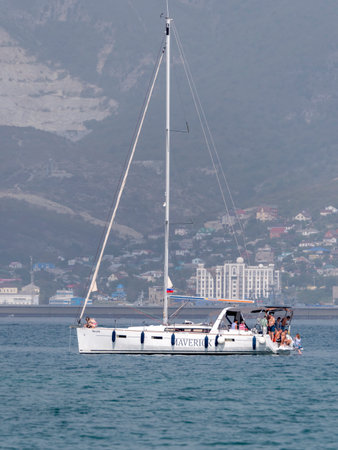 Novorossiysk, Russia - 18 August 2023. red port ship name Maverick in the port of Novorossiysk Black Sea.のeditorial素材