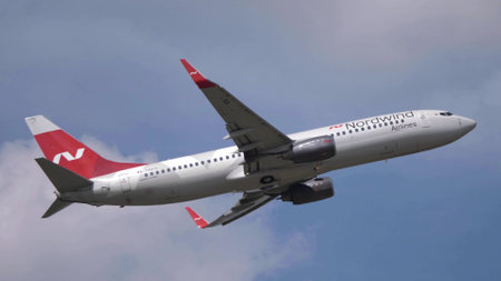 MOSCOW , RUSSIA, June 10, 2019: The Commercial passenger airplane flying overhead on sunny day on June 10, 2019 in Moscow, Russia.のeditorial素材