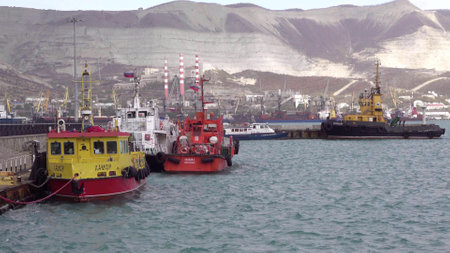 Novorossiysk, Russia - 18 August 2023. red port ship name Locman 3 in the port of Novorossiysk Black Sea.のeditorial素材