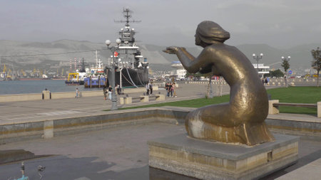 Novorossiysk, Russia - 08.18.2023. Sculpture Giving water and a house with a turret, Black Sea, port, Krasnodar Territory, Novorossiysk.のeditorial素材