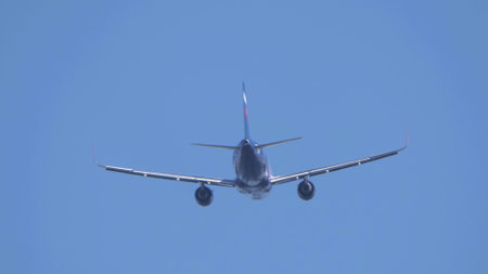 MOSCOW , RUSSIA, June 10, 2019: The Commercial passenger airplane flying overhead on sunny day on June 10, 2019 in Moscow, Russia.のeditorial素材