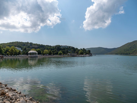 Picturesque view of embankment of lake Abrau on sunny day in Abrau Durso.の写真素材