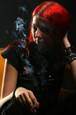 Beautiful girl smokingの写真素材
