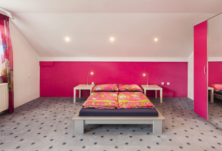 Bright modern bedroom with illuminated lights
のeditorial素材