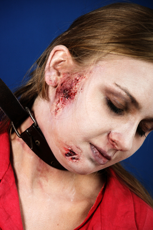 Girl in a red dress hangedの写真素材