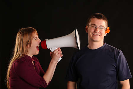 Couple having a fight and man but man is really ignoring herの写真素材