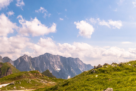 Beautiful Mountain Landscape Against Blue Cloudy Sky At Summerの写真素材
