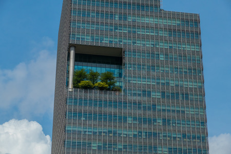 Architectural Pattern On Modern Skyscraper Against Sky In Singapore At Day.の写真素材