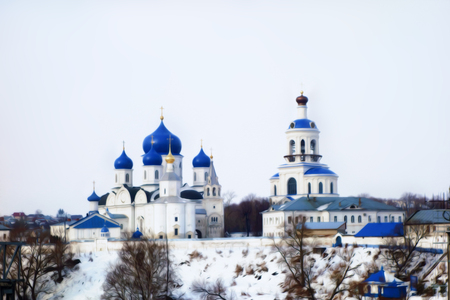 Winter frosty day view of the old russian monastery. blue and white photo manipulation.の写真素材