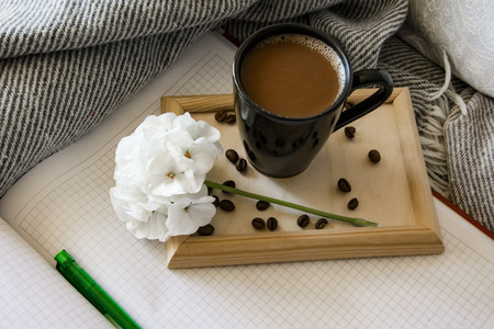 Delicious breakfast in bed with toast and a big cup of coffeeの写真素材