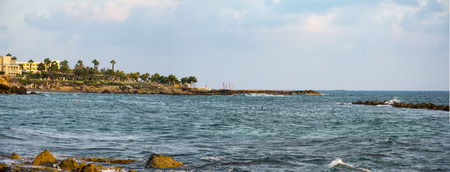 sea waves amongst rocky beach, Cyprus, Paphos,