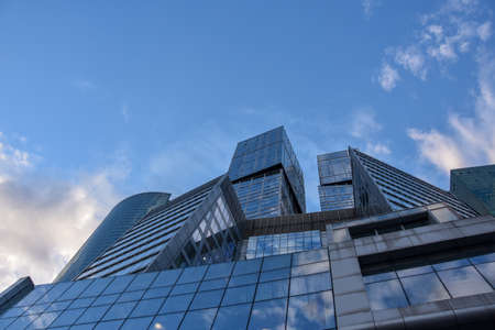 blue sky framed by the tops of skyscrapers, Moscow Manhattan, Moscow-City district, glass...