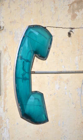 Phone hanging on the wallの写真素材