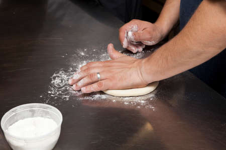 Process of making pizza or Focaccia. Step-by-step instructions. Step 1. Cook prepares dough.