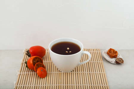 Sujeonggwa - Traditional Korean fruit tea or Persimmon punch.