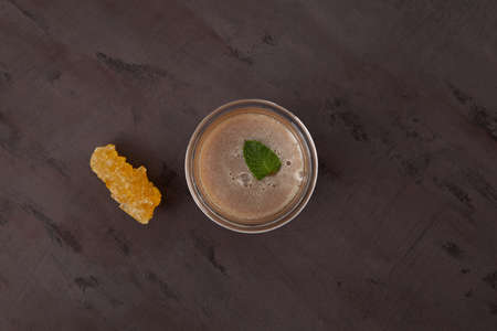 Mint tea or Indian Pudina chai. Top view. Hot drink with milk and fresh mint leaves.の写真素材