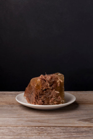 Beef jelly or aspic on dark background with copy space. Rustic style.の写真素材