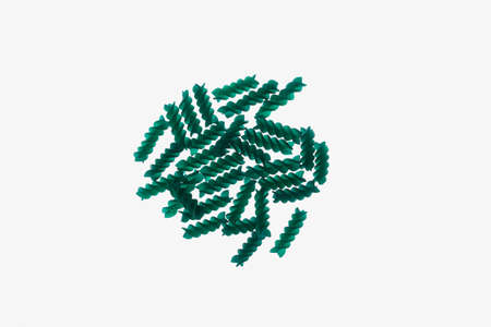 Fusilli with spirulina or chlorella. Green pasta products. Trend - increase consumption of food with...