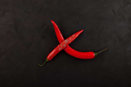Spoiled Moldy Chili Peppers. Dark background, selective focus, copy space.の写真素材