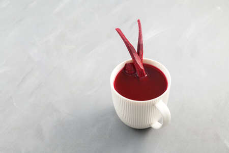 Salgam - popular Turkish drink, made from fermented purple carrots, turnips or beets. Selective focus, space for text.の写真素材