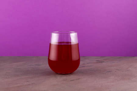 Salgam or fermented beet juice in clear glass. Popular Turkish drink. Traditional beverage made with water, purple carrot or turnip (juice).の写真素材