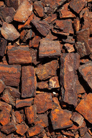 scrapmetal. Rusty iron and Old rusty pieces of scrap iron, close-up. Design element, selective...