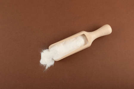 Salep flour in wooden scoop. Salep, also spelled sahlep or sahlab is a flour made from tubers of the...