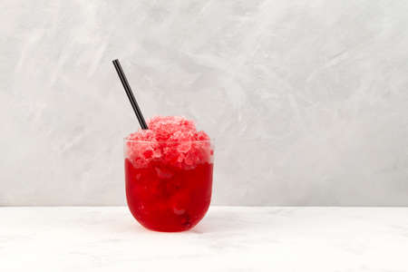 Red Slushies. Sweet Shaved Ice. Spanish fruit granizado drink. Refreshing summer iced drink.の写真素材
