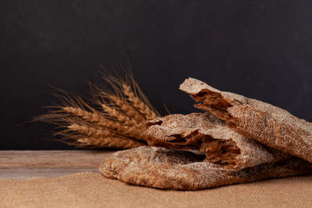 Rye Puff Bread, close-up. Homemade sourdough bread. Healthy baking. Selective focus, rustic style.