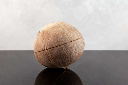 Coconut with incision in the middle for the convenience of splitting into two halves. Refreshing...