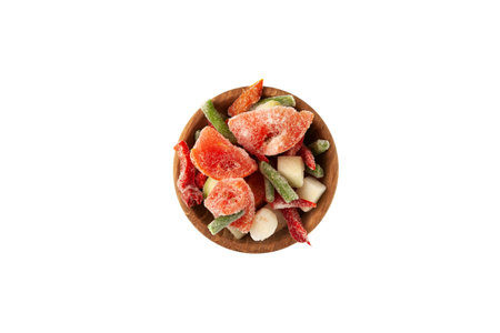 Frozen vegetables, tomatoes, string beans, zucchini, red pepper in wooden bowl isolated on white background, top view. Concept - Freezing and proper defrosting of vegetables.の写真素材