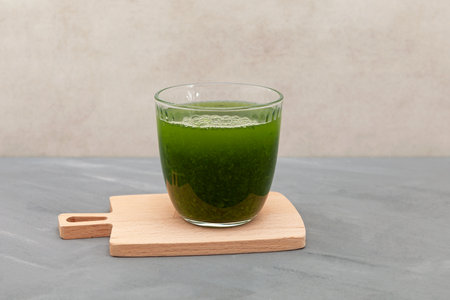 Glass of Herbal Smoothie. Healthy drink, tincture of green medicinal herbs. Detox. natural antioxidant. alternative medicine.の写真素材
