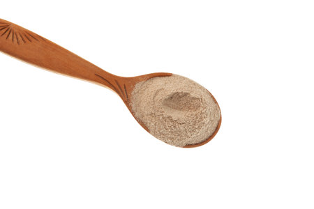 Psyllium flour in wooden spoon, close-up. Crushed Psyllium seeds and husk has been used as a thickener in ice cream and other frozen desserts.の写真素材