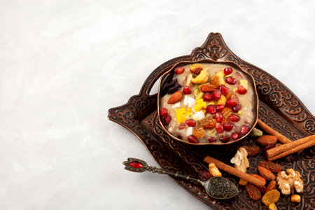 Ashure, Turkish dessert porridge. traditional turkish cuisine. Noah's pudding. Sweet porridge, which consists of grains, fruits, dried fruits and nuts.の写真素材
